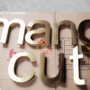 Gia công chữ inox vàng Mang Cut